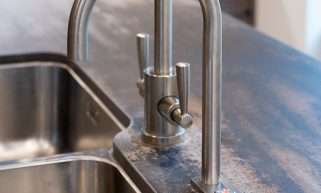 Quatreau SmartTap boiling, chilled and sparkling tap fitted over a kitchen sink