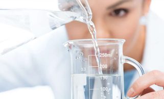 Scientist testing fluoride in tap water